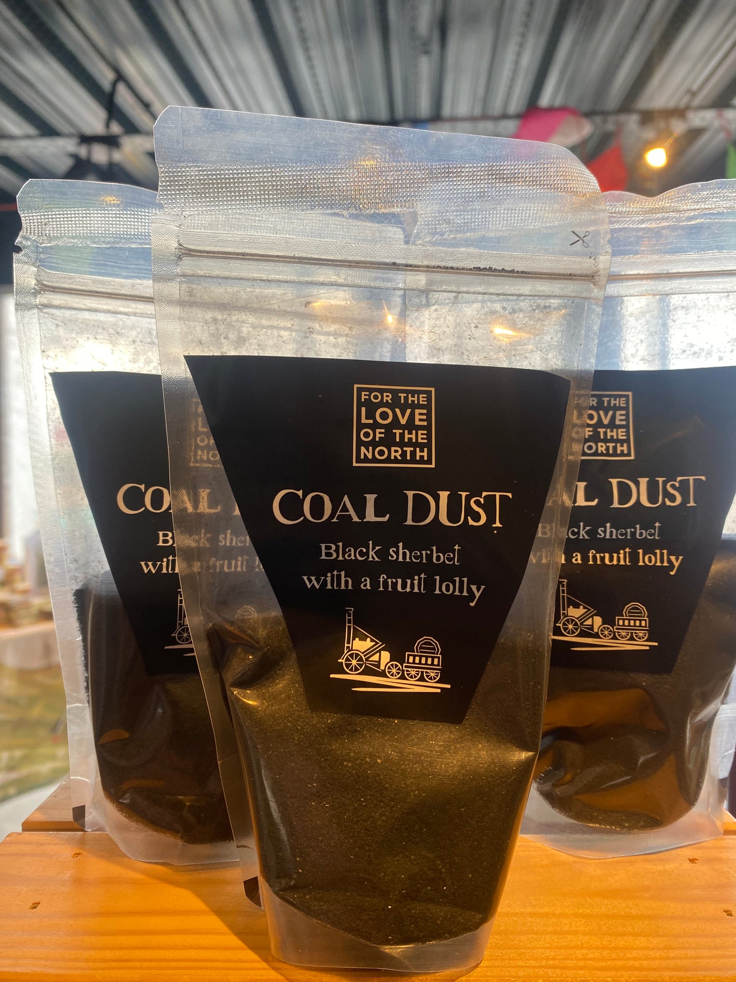 Coal Dust - Black sherbet with a colour changing lolly