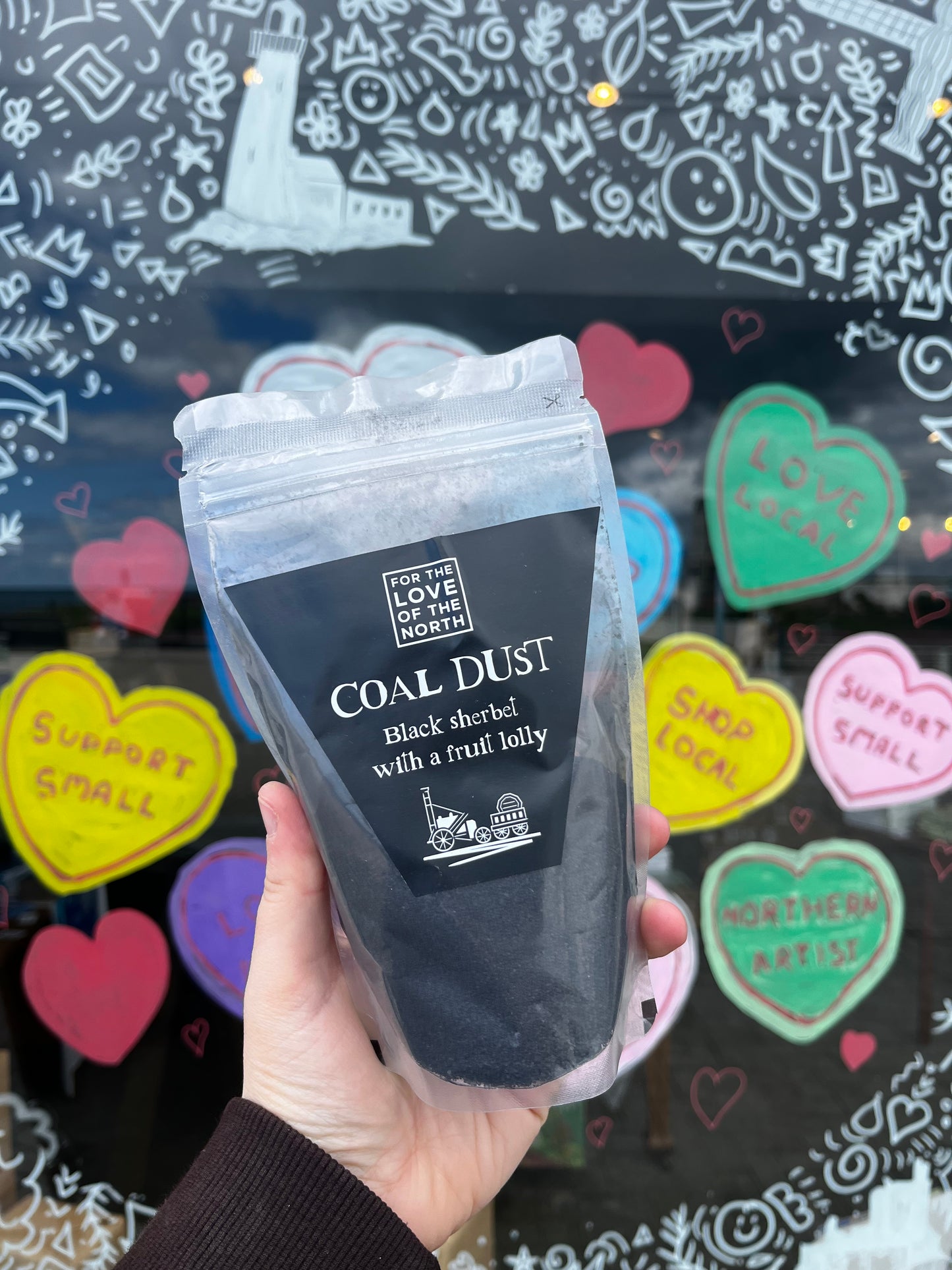 Coal Dust - Black sherbet with a colour changing lolly